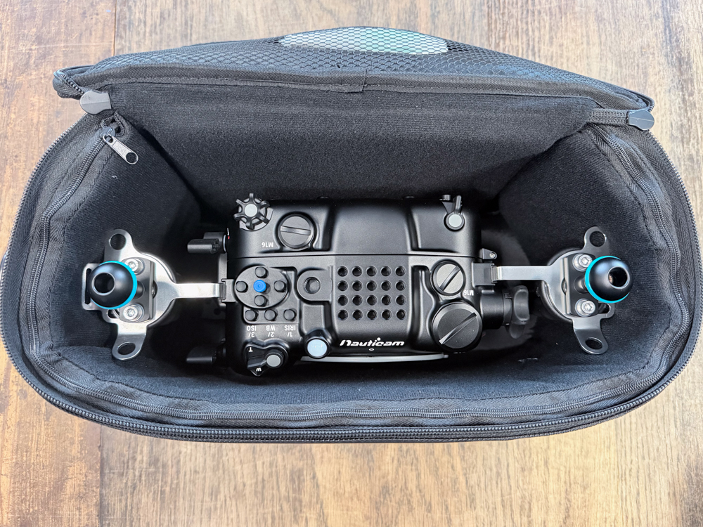 Top view of the Nauticam NA-FX5 housing packed in its padded carrying bag