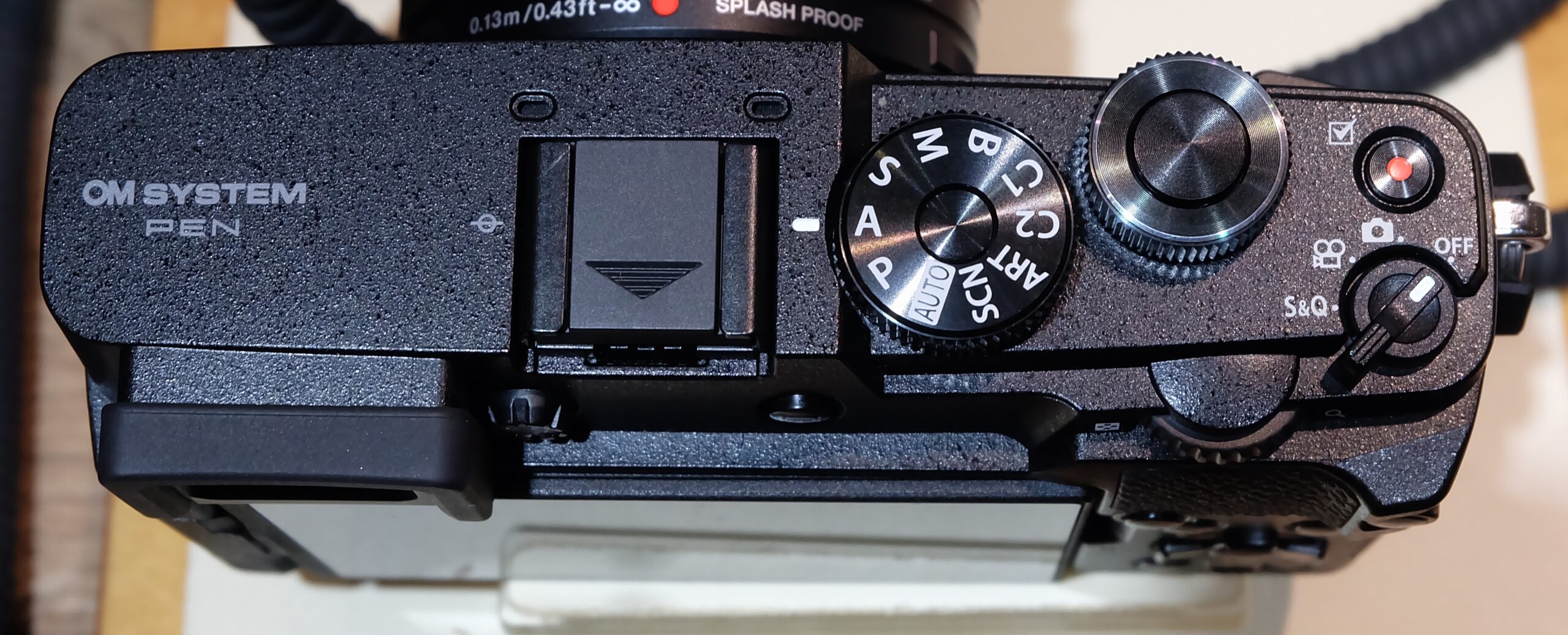 Top controls of the 2026 OM SYSTEM PEN camera